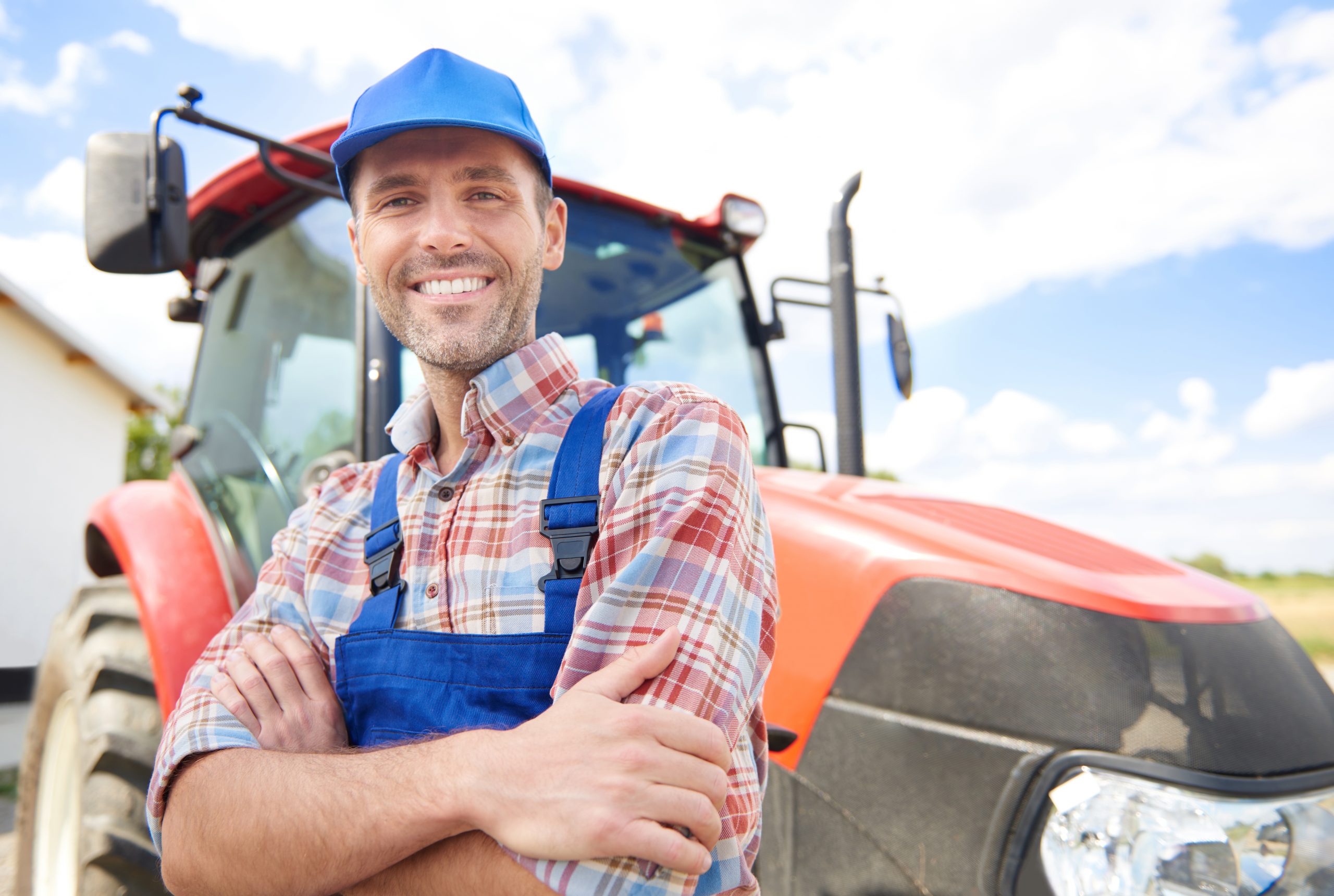 Farmer leaning on the tractor